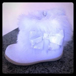 White fur boots